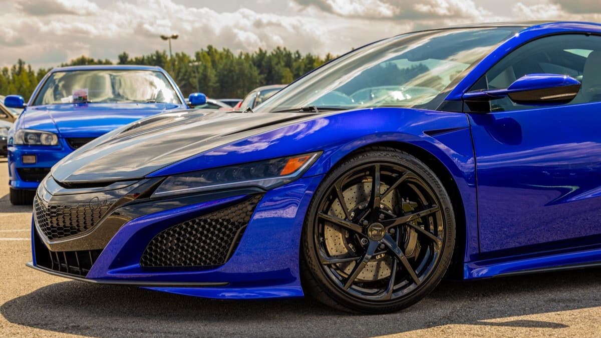 Photo: Maciej Cisowski / Pexels Front quarter of a blue second-generation Acura NSX at a car gathering.