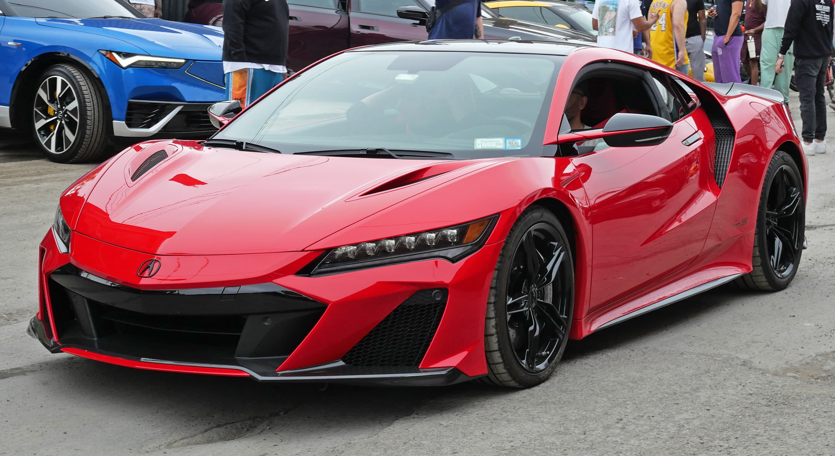 Photo: Kevauto / Wikimedia Commons, CC BY-SA 4.0 Red Acura NSX Type S viewed from the front left at an outdoor car gathering.